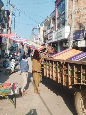 The municipality launched a campaign to remove encroachment, seized boards and goods