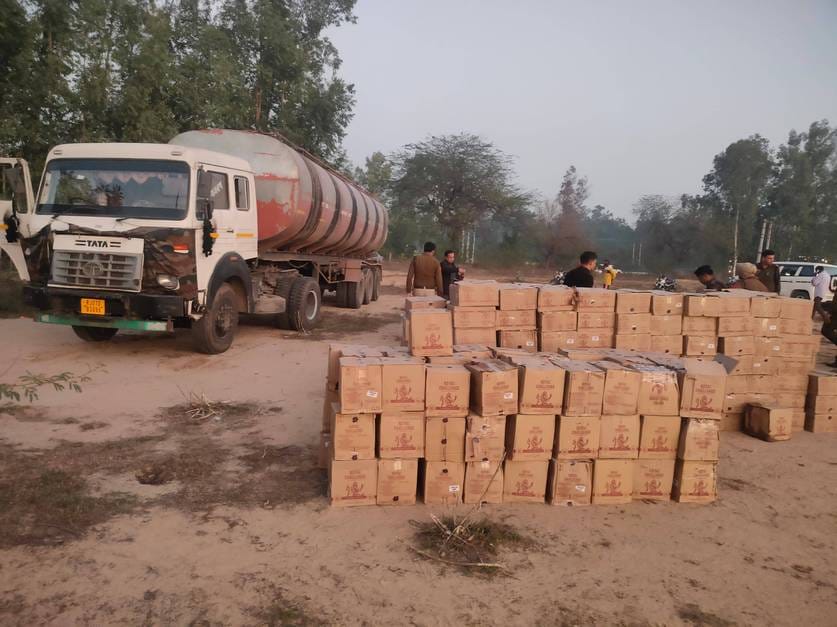 Liquor being smuggled to Gujarat hidden in an oil tanker seized
