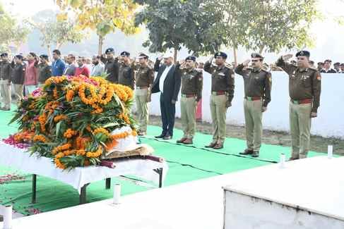 Last farewell to the martyr with tears...school children showered flowers