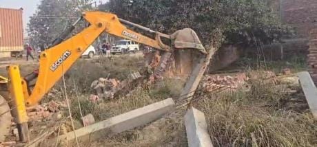 Bulldozer runs on government land, altercation with Tehsildar