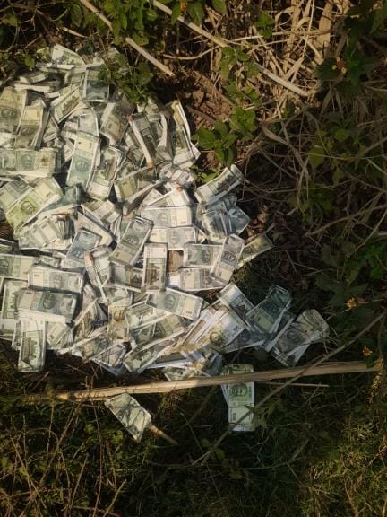 Police from two police stations rushed to the spot after receiving information about a sack of Rs 500-500 notes, found with 'Children Bank' written on it.