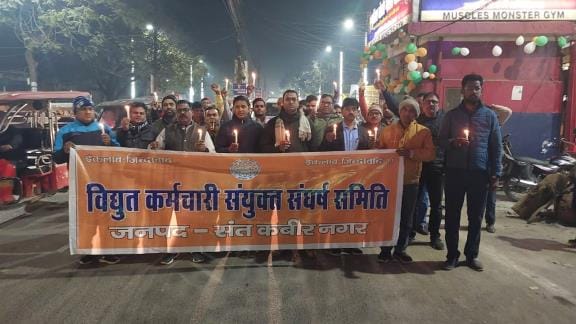 Electricity workers took out a candle march to protest against privatization