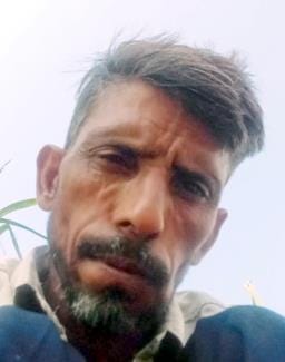 Laborer's body found hanging from a tree, murder alleged
