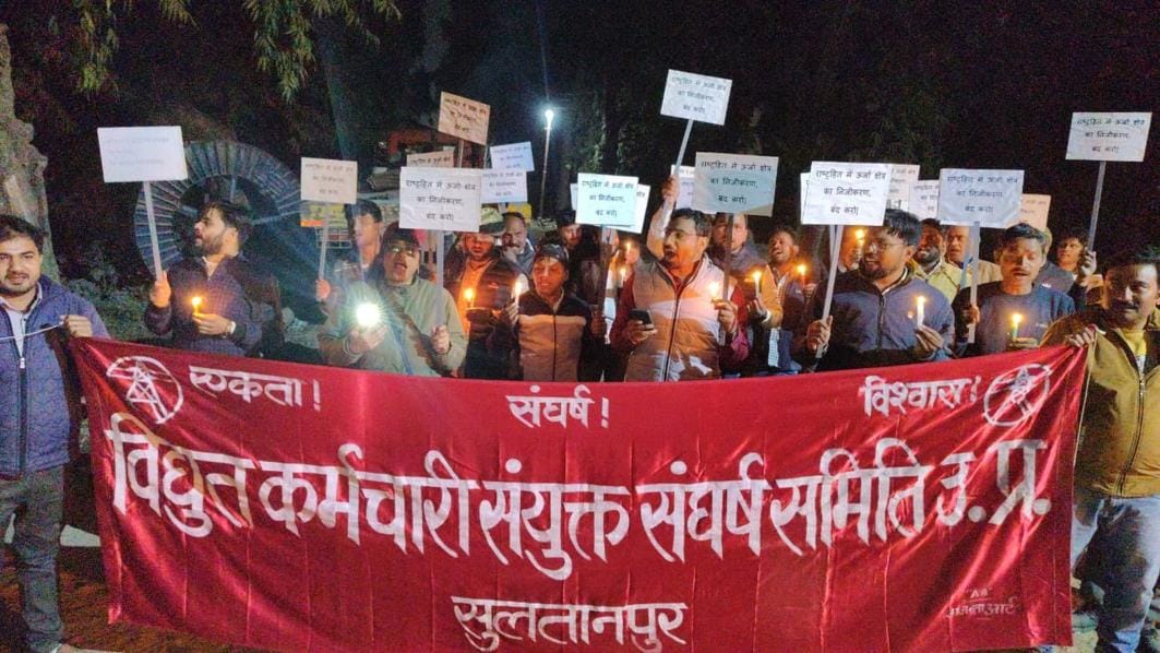 Electricity workers took out a candle march to protest against privatization