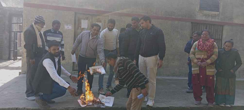 Teachers protested by burning copies of UPS