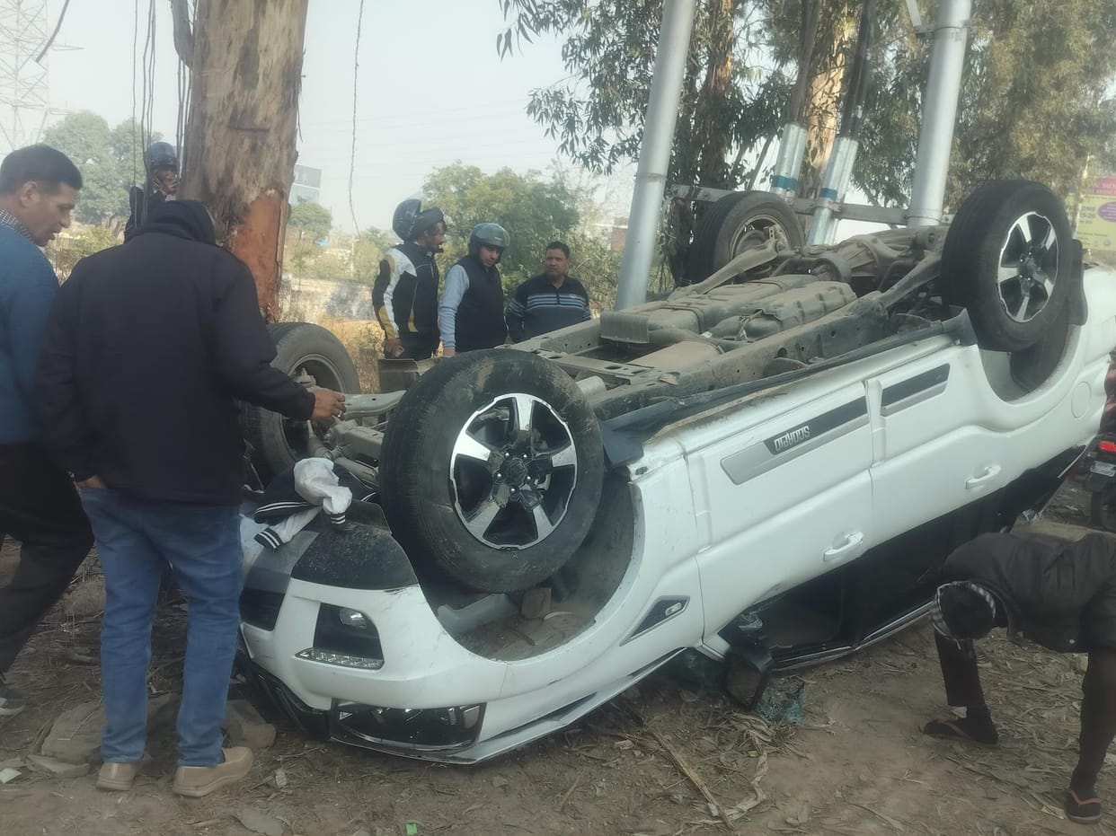 Car overturned after hitting a pole, two injured