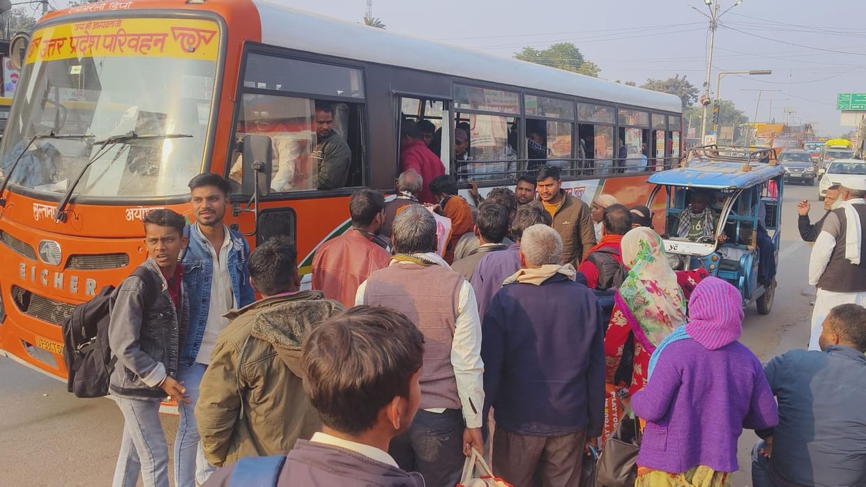 Waiting for hours for buses, fighting to board