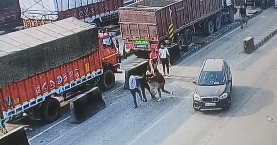 Fight at toll plaza after truck hits side