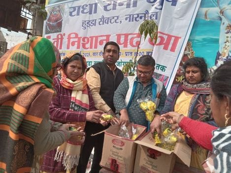 Prasad of curry, rice and biscuits distributed on Vasant Panchami festival