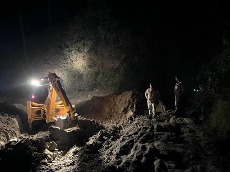 Cutting done with JCB on forest land without permission, operator ran away after seeing the team, controlled at a distance of 200 meters
