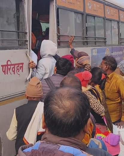 jostling to board buses