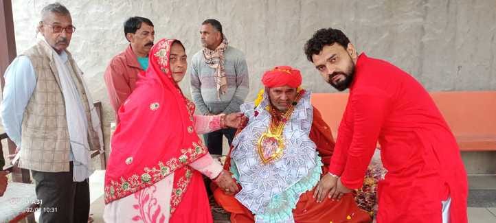Ajitananda welcomed back after becoming a Naga monk