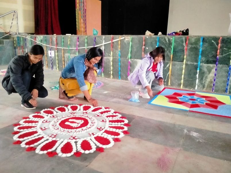 Anu got first place in Rangoli competition