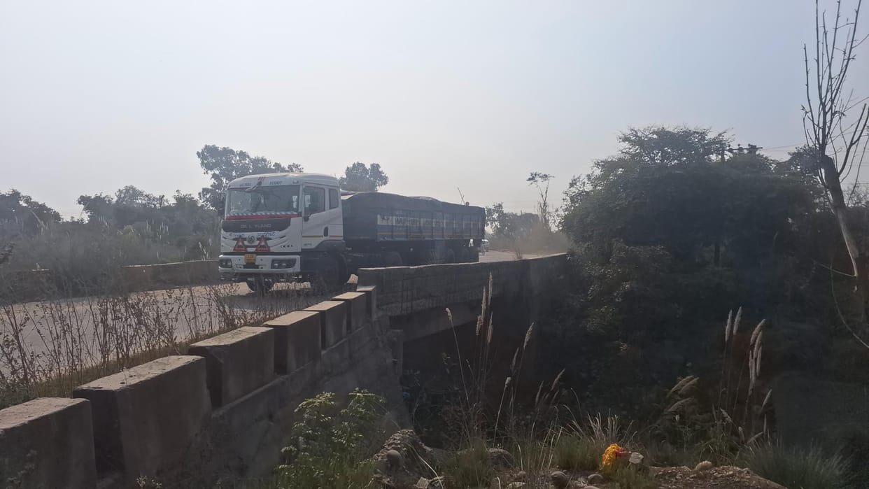 Heavy Vehicles Cross Over Unsafe Bridge