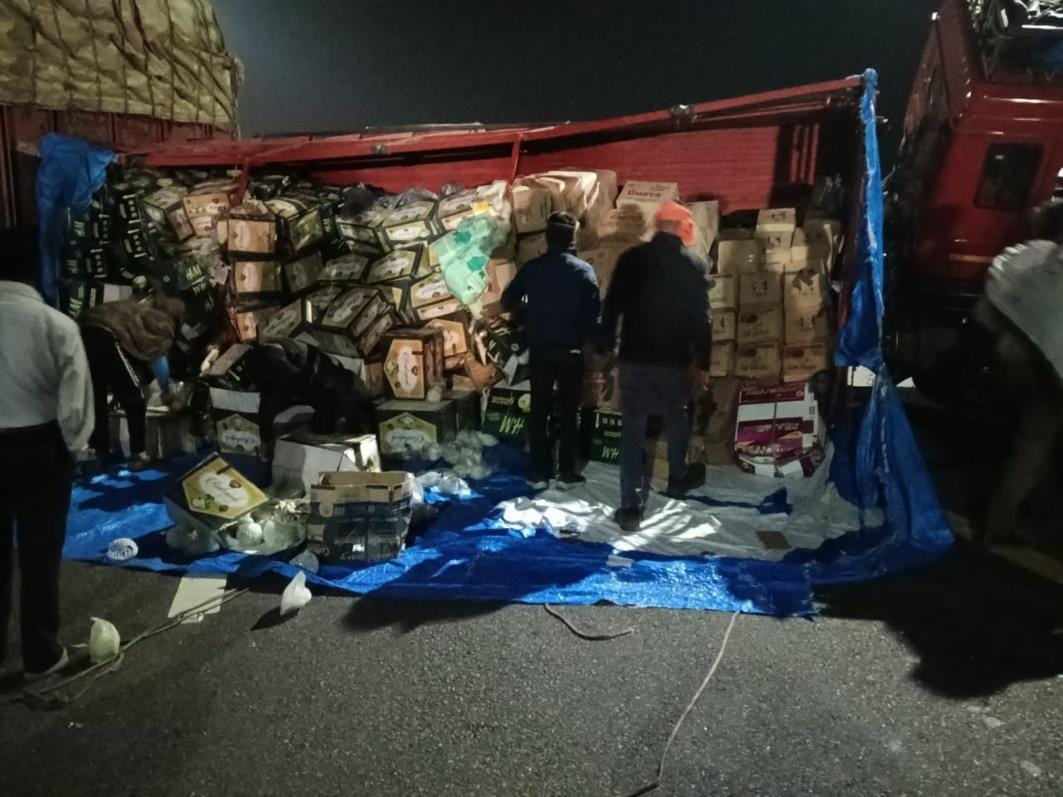 One overturned after two trucks collided with each other