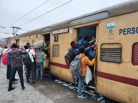 Rajyarani arrived after waiting for four hours...seats full, even the luggage van was filled with passengers