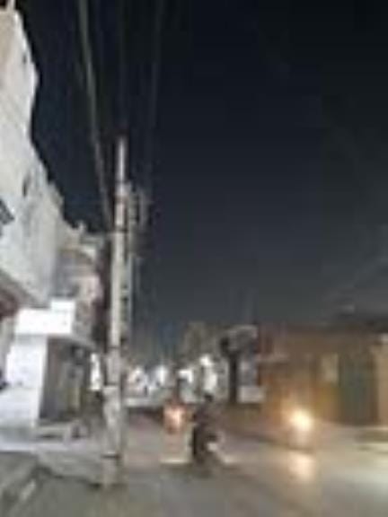 Street lights broken, darkness on the main road