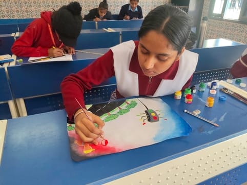 Thisha of Aterna made the most beautiful poster in the district level competition