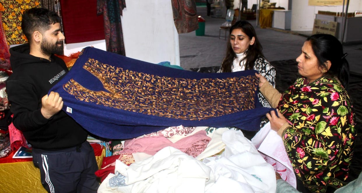 Women were seen buying hand made sarees in the exhibition of Khadi and Village Industries Commission