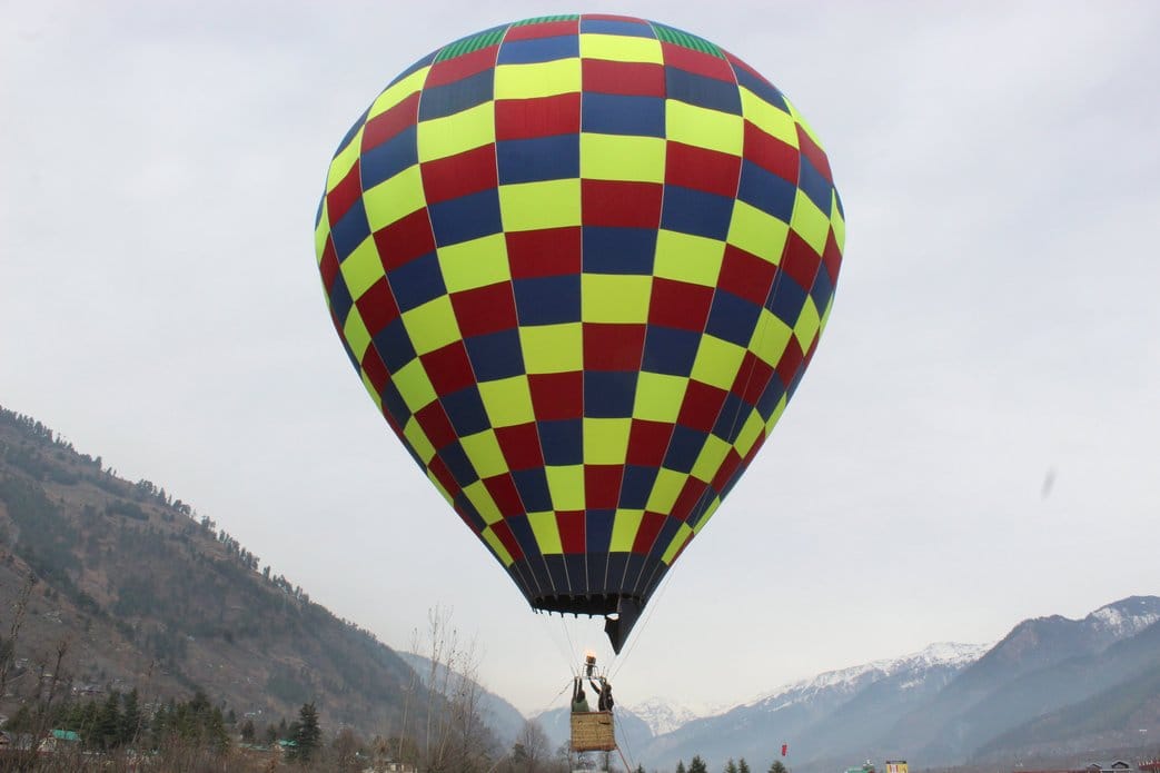 Manali is buzzing with tourists during the weekend, having fun in the snow
