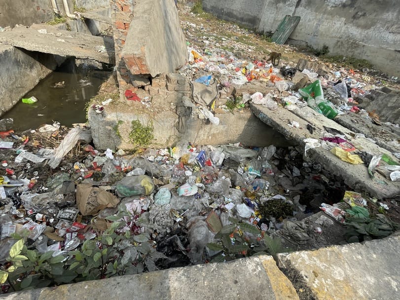 Polythene stuck in drains, water drainage affected