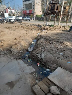Bungalows worth crores, broken roads and heaps of garbage in the facility