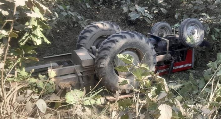 Tractor overturns while trying to save bike rider, driver dies