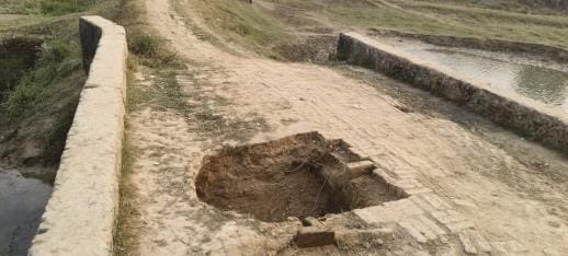 Deadly potholes on the bridge, approach also damaged... danger of accident