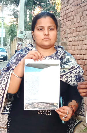 Woman complains to DC regarding getting street level corrected