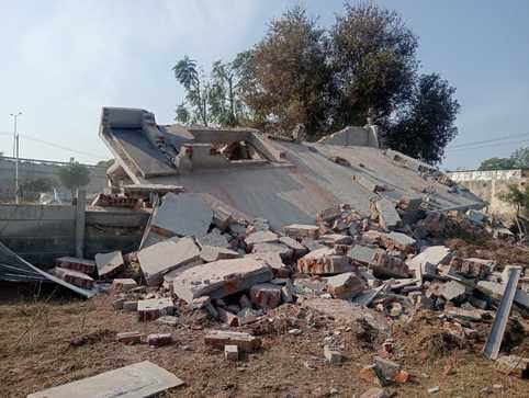 Bulldozer runs on illegal construction