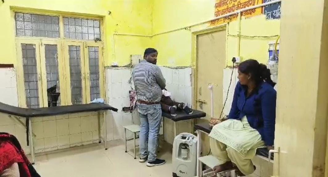Sweeper giving injection in emergency