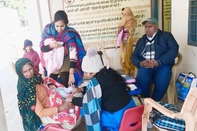 Vaccinated children and pregnant women in four villages