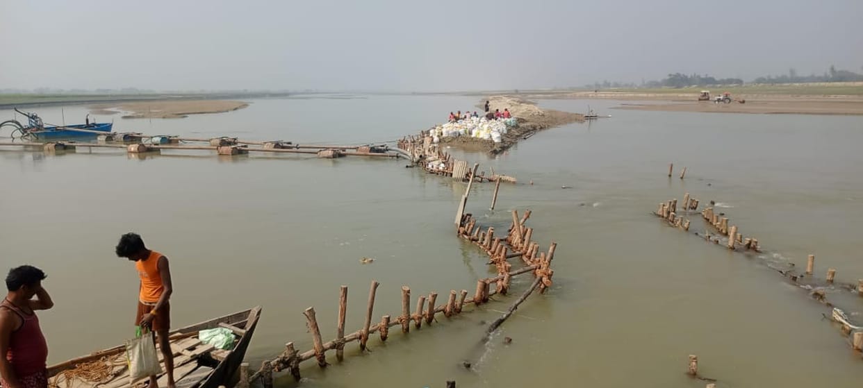 The stream of Rapti river is being diverted by building a dam