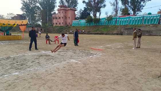 Youth are having fun in 100 meter race and high jump