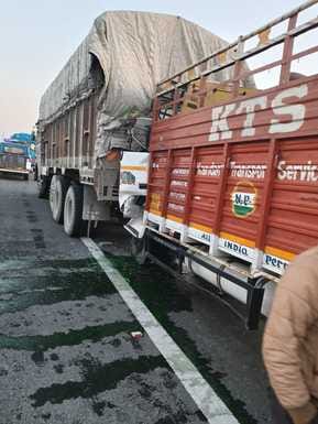 Canter collides with parked truck, driver dies