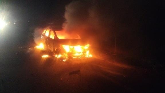 A car caught fire on the highway