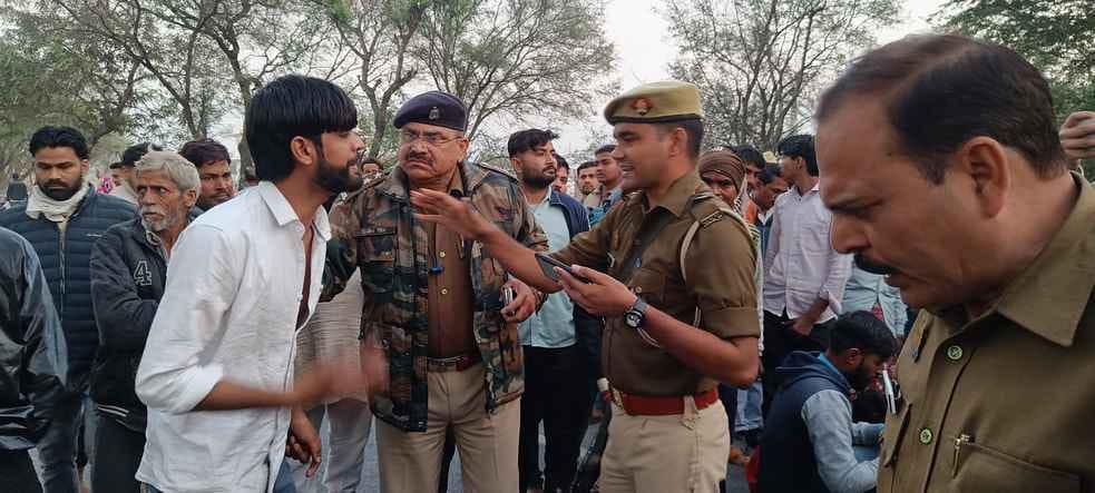 Mason's body found in field, relatives block road