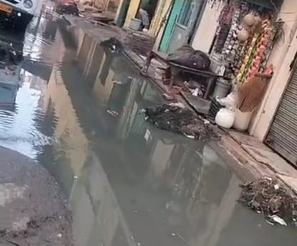 Water filled road on road in Karkad model village, people worried