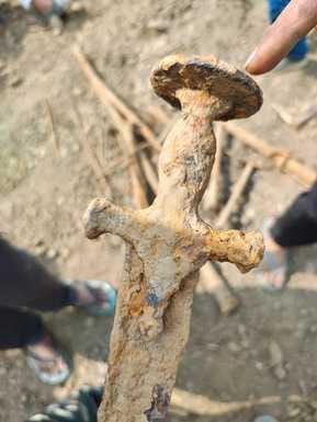 Two ancient swords and five pipes found during digging in the field