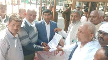 Expressed anger over removal of three thousand employees, demanded reinstatement