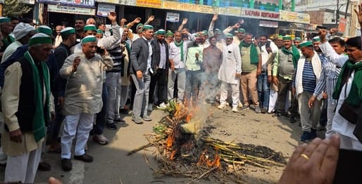 Farmers angry over price increase burn sugarcane at Collectorate gate