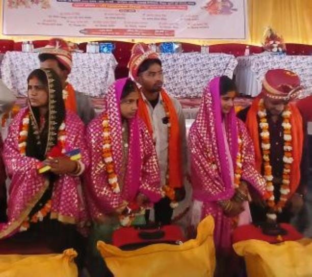 Mantras and verses echoed, 245 couples joined each other