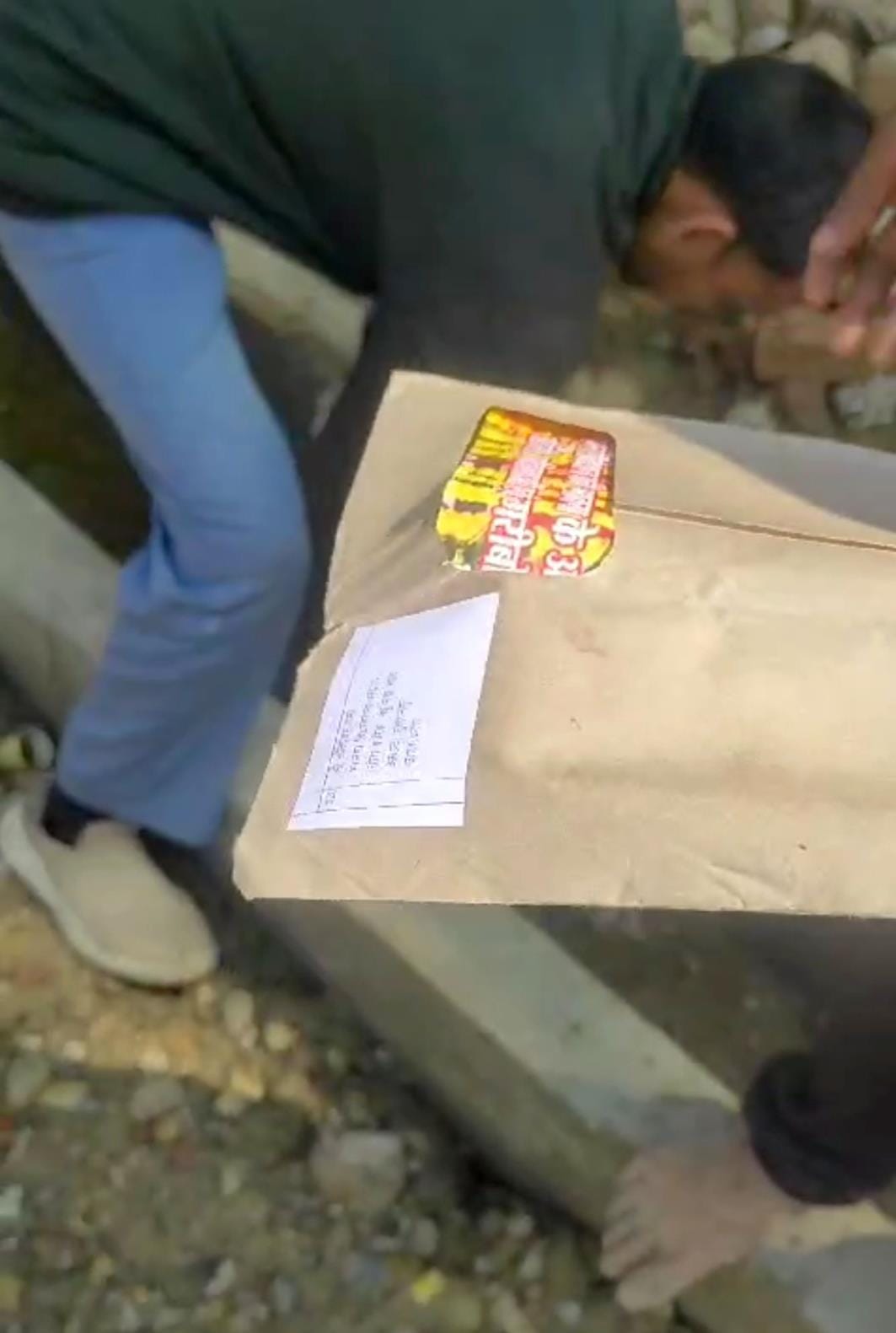 The bundle of mail on the side of the road