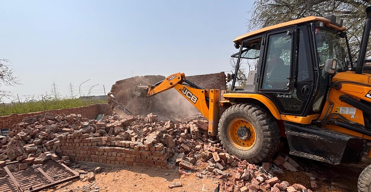 The District Town Planning Department demolished illegal construction on two and a half acres near Bapodra