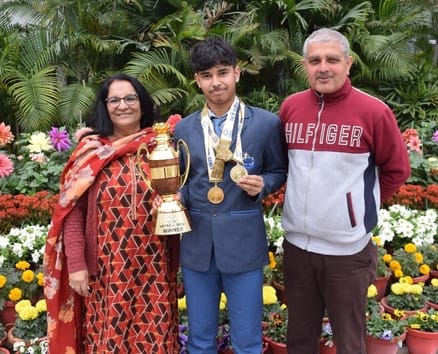 Aryan was welcomed after returning after winning a medal in the netball event of the National Games