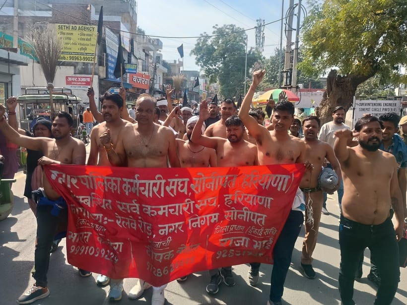 Contract sanitation workers took out a procession half naked for their pending salary