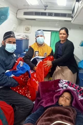 Pregnant woman delivered in ambulance