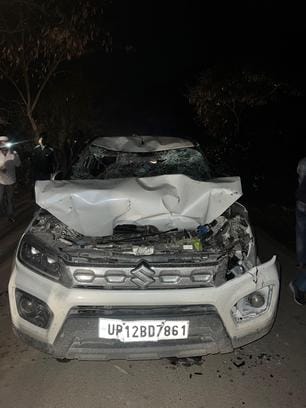 Five car passengers injured in collision with truck