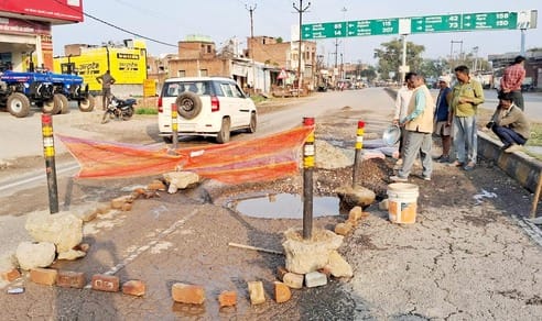 Drain water was prevented from coming on the highway, potholes were repaired