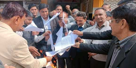 Protest expressed by burning copies of the proposed Advocate Amendment Bill